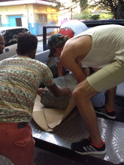 Transporting the boulder for Kevin Schuit's installation. Photo courtesy Omar Kuwas.