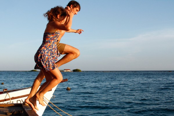 Sofia Maldonado and Kevin Schuit jump off pier. Image by Mark King
